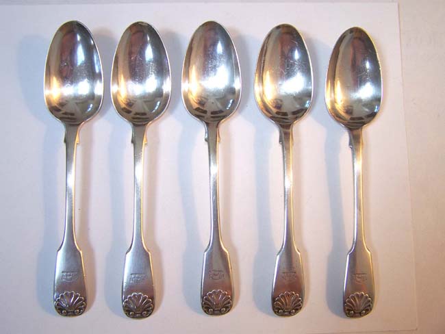 A Set of five Sterling Silver "Double Shell" fiddle pattern Dessert Spoons by Mary Chawner, London, 1834.